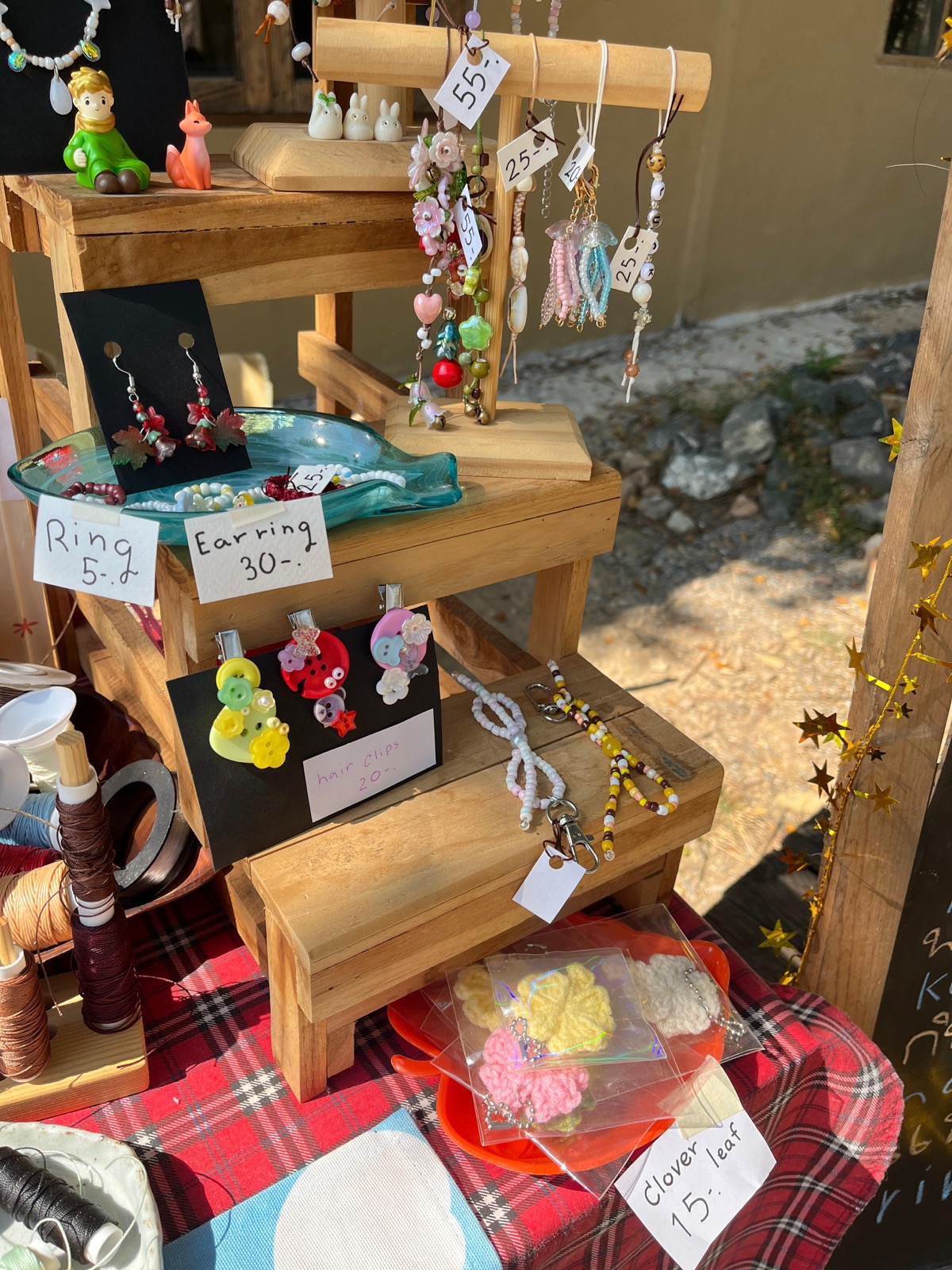 Handmade jewelry display at KIN-GYO workshop in Thailand